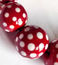 Handmade red and white patterned lamp work glass beads - Image 4