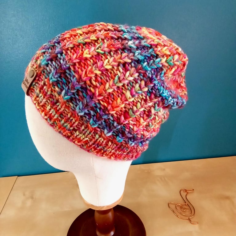 Hand Knit Beanie Hat. Bright rainbow coloured acrylic yarn. Medium adult fit.