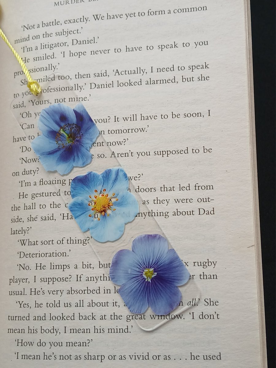 Clear acrylic bookmark decorated with blue flowers decals 