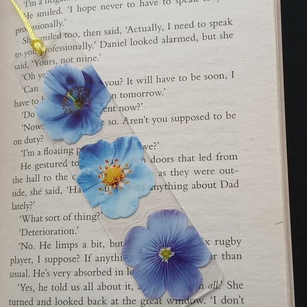 Clear acrylic bookmark decorated with blue flowers decals 