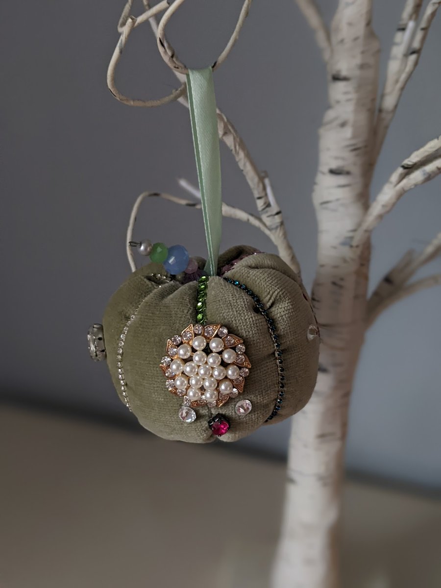 Handmade Christmas velvet bauble in moss green
