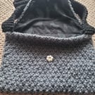 Hand knitted shoulder bag. Grey and black