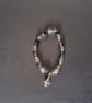Elasticated bracelet with blue and clear beads and silver shell charm  - Image 4