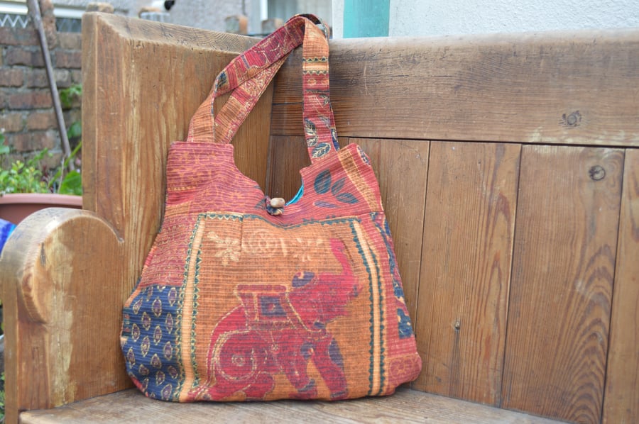 Elephant motif handbag
