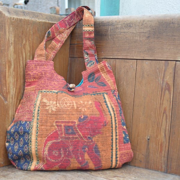 Elephant motif handbag