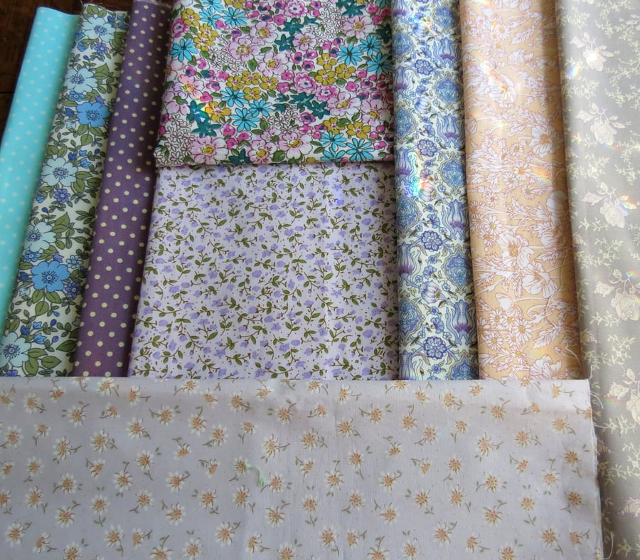 Fabric destash!  A bundle of 9 good size pieces of cotton fabric.