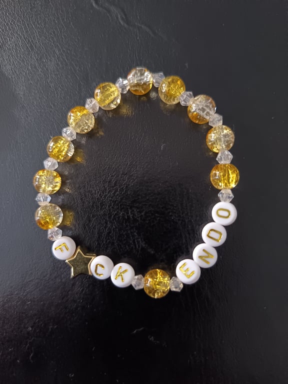 Elasticated endometriosis letter and yellow beaded bracelet