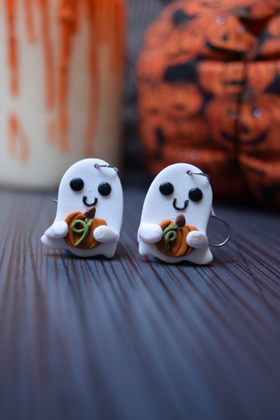 Ghost shaped dangle earrings with a pumpkin 
