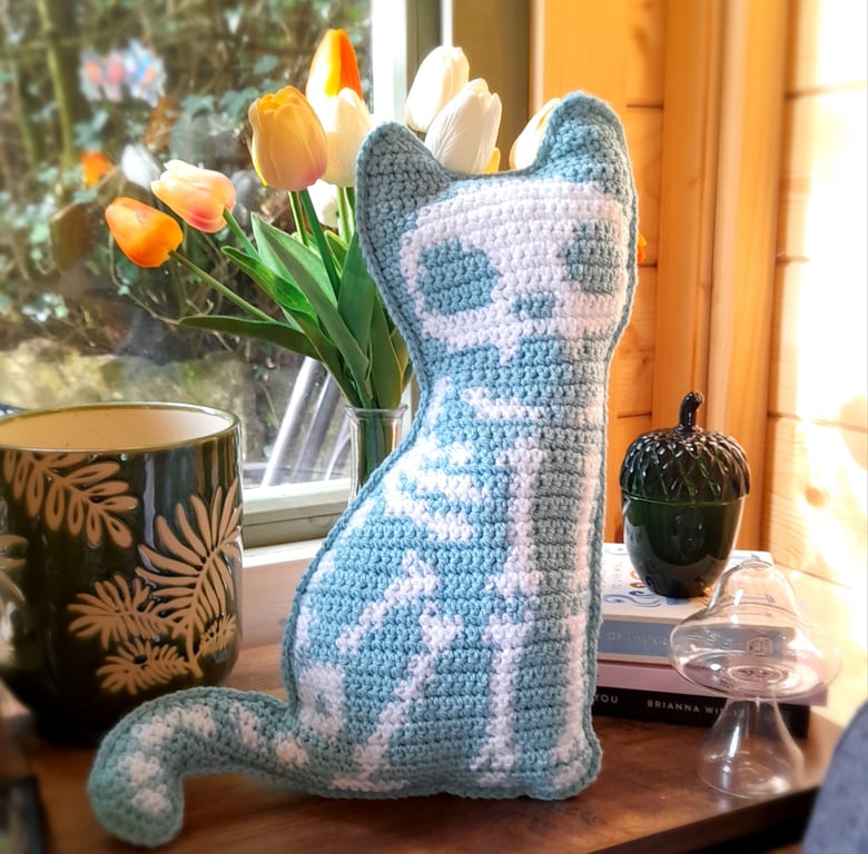 Spooky Crochet Cat Mini Cushion - Blue with white bones
