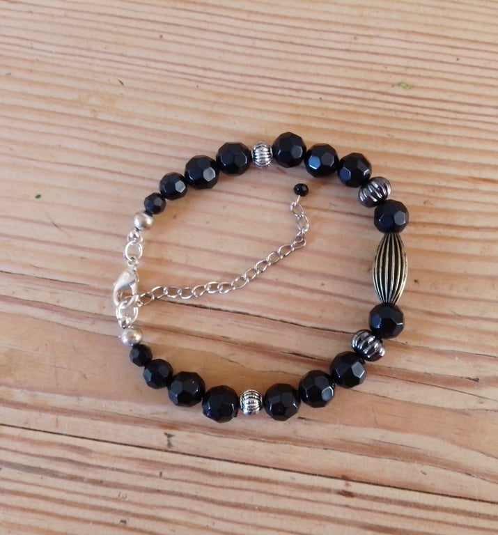 Handmade bracelet made using pre-loved beads.