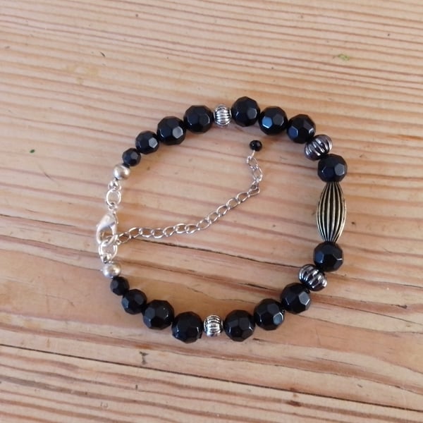 Handmade bracelet made using pre-loved beads.