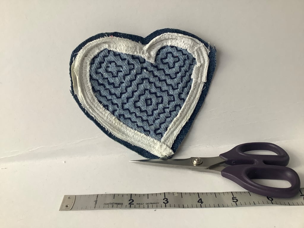 Denim and sashiko etched heart patch. 
