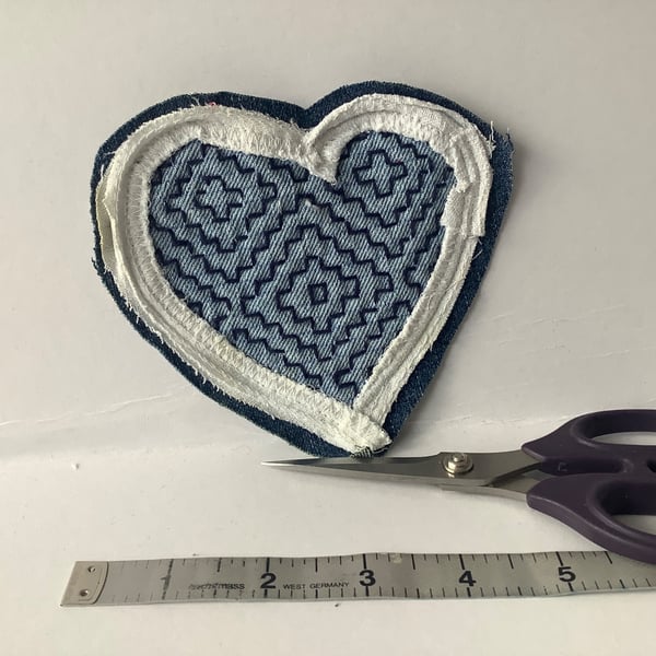 Denim and sashiko etched heart patch. 