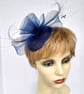 Small navy blue fascinator