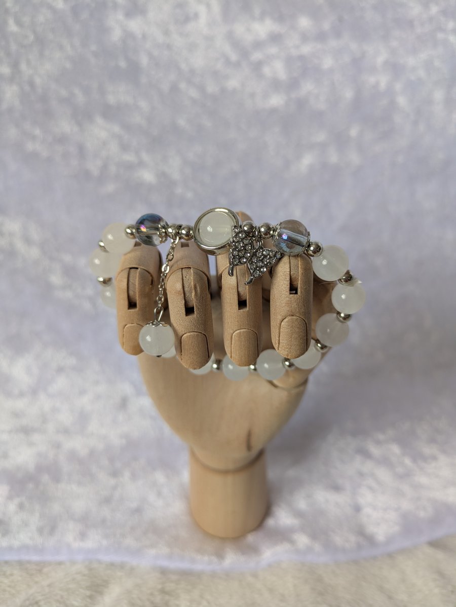 White clouded bead bracelet with butterfly charm