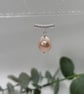 Silver pendant with peach freshwater pearl