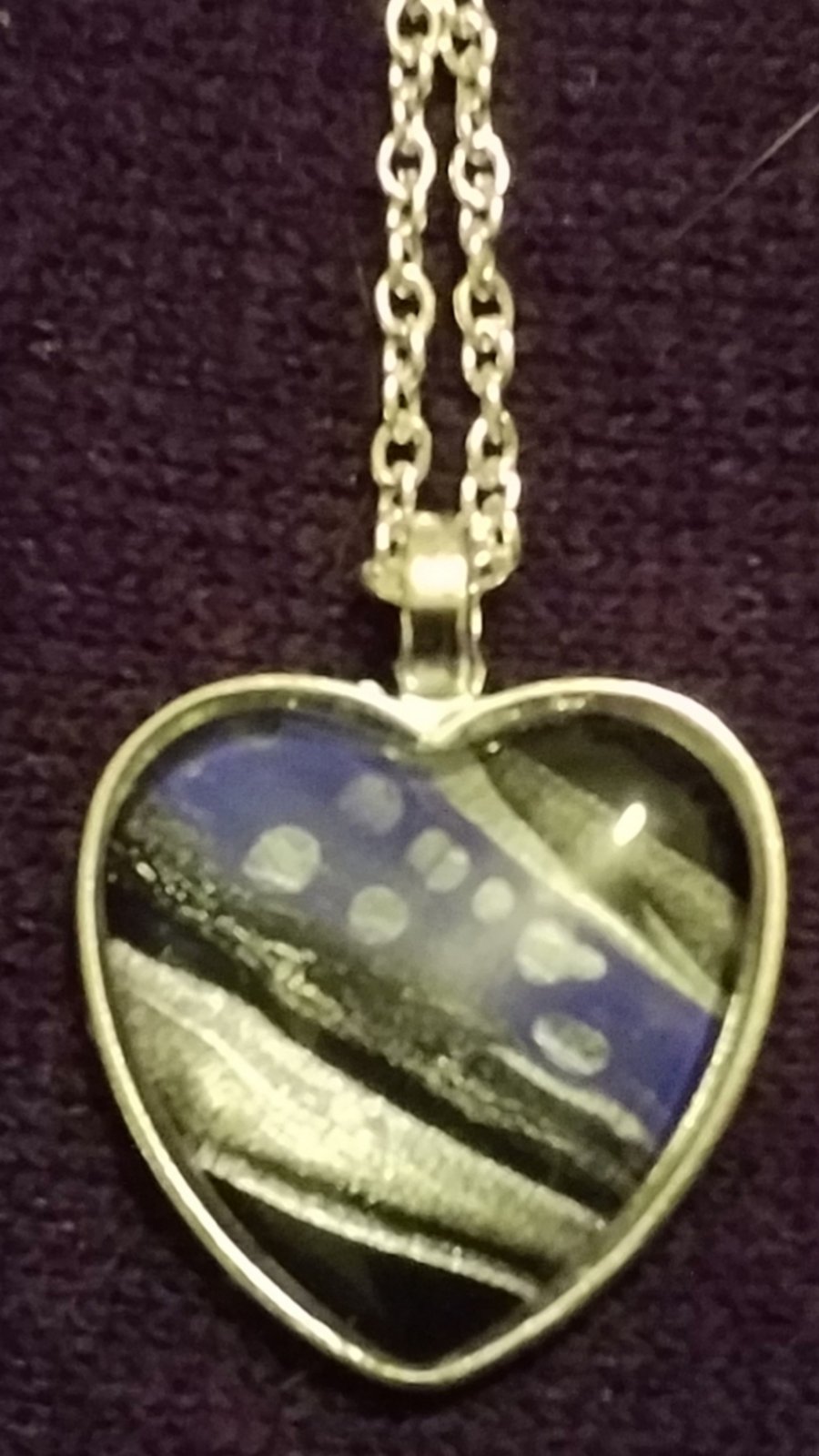 Handmade fluid heart pendant. Dark blue, silver and black.