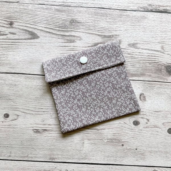 Discreet sanitary pouch. Feminine products holder. Ditsy floral grey.