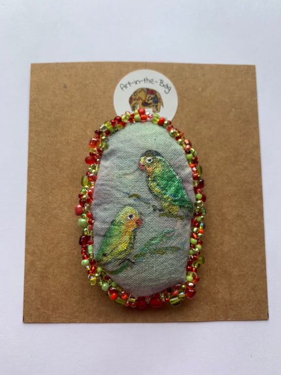 Handmade and hand painted fabric pin brooch with love bird design 