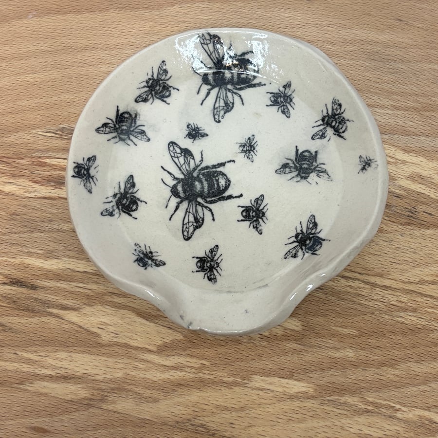 Spoon rest with bee  design made from stoneware