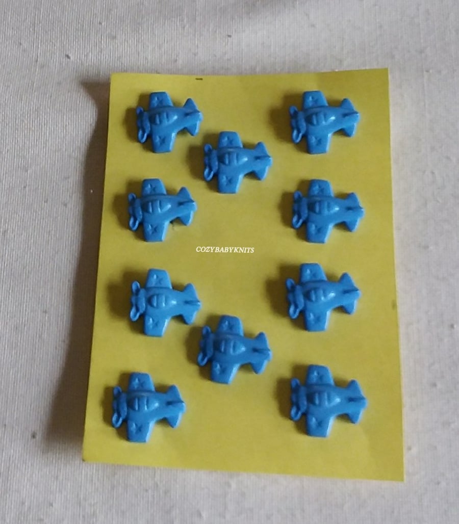 BLUE PLANE BUTTONS WITH A SHANK ON THE BACK FOR ATTACHING 
