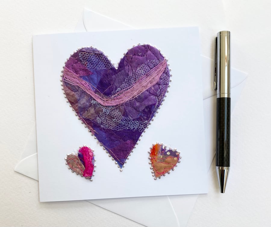 Up-cycled handmade fabric embroidered heart card. 