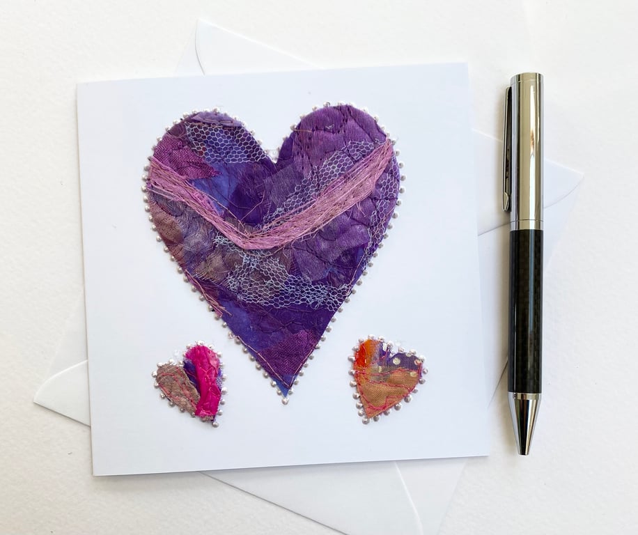 Up-cycled handmade fabric embroidered heart card. 