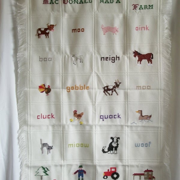 Shawl, blanket or wall-hanging entitled 'Old MacDonald had a farm'.