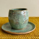 Hand pinched tea cup and saucer in Olive Green