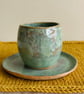 Hand pinched tea cup and saucer in Olive Green
