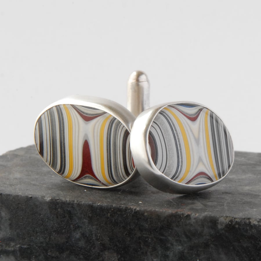 Sterling silver and 90's fordite swivel back cufflinks