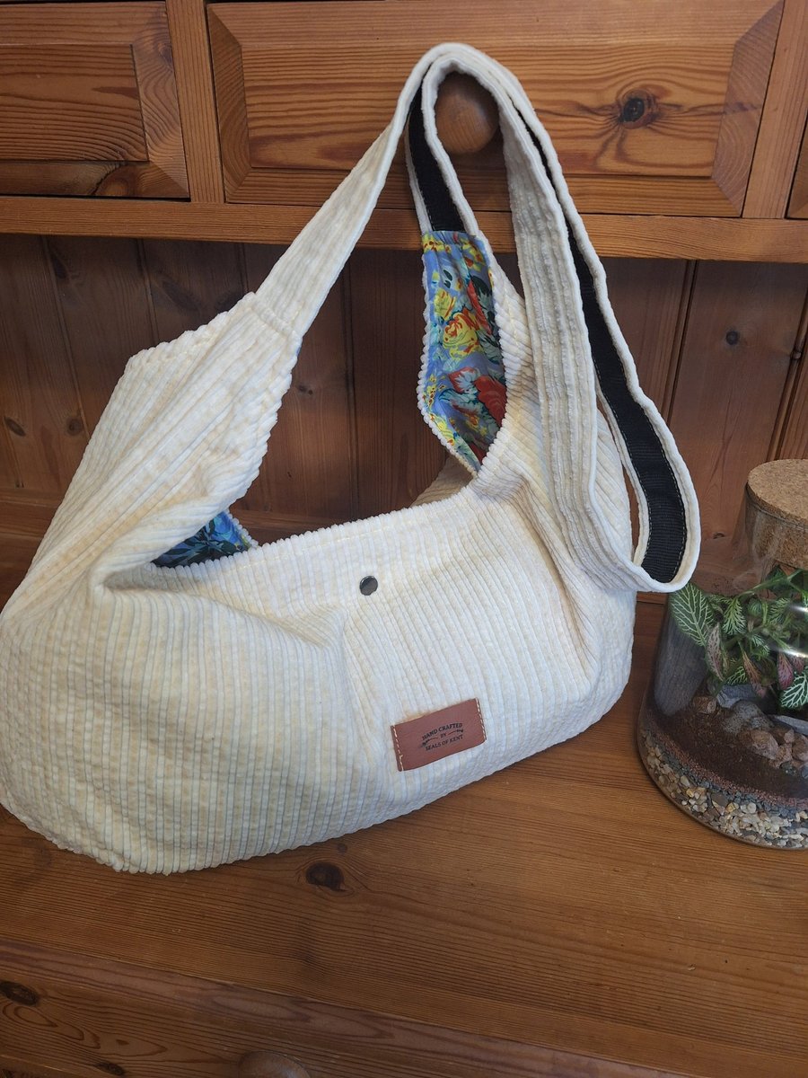 Yellow corduroy hobo bag with floral lining
