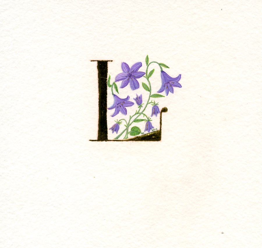 Personalised letter in 24c gold leaf with purple lilies and harebells