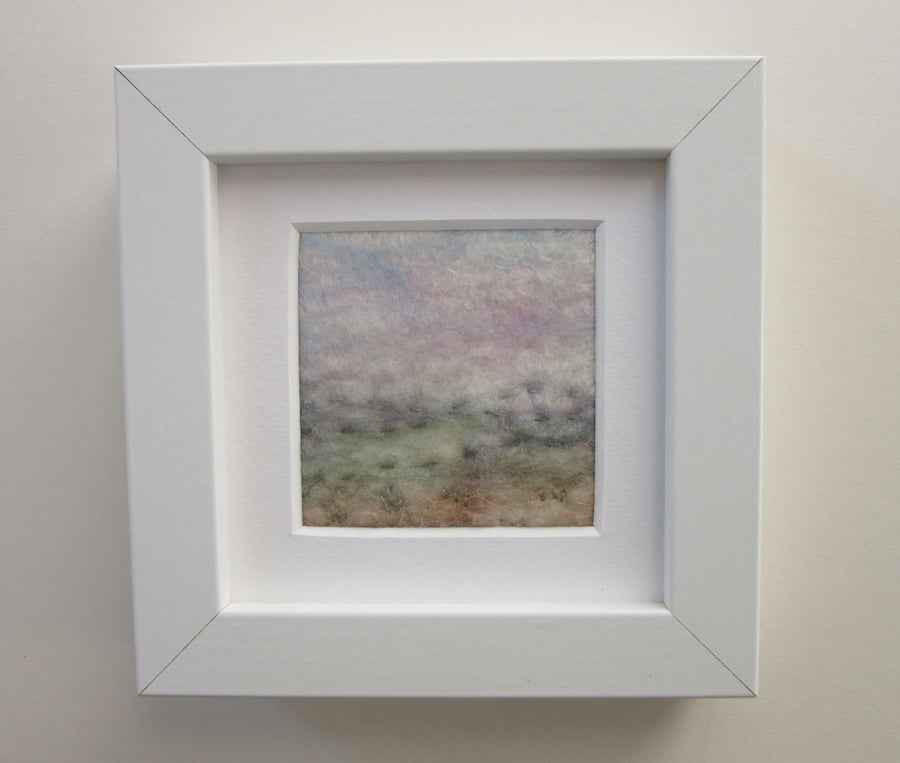 Small landscape picture, hand felted, white frame
