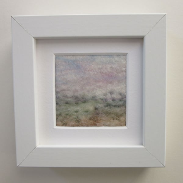 Small landscape picture, hand felted, white frame