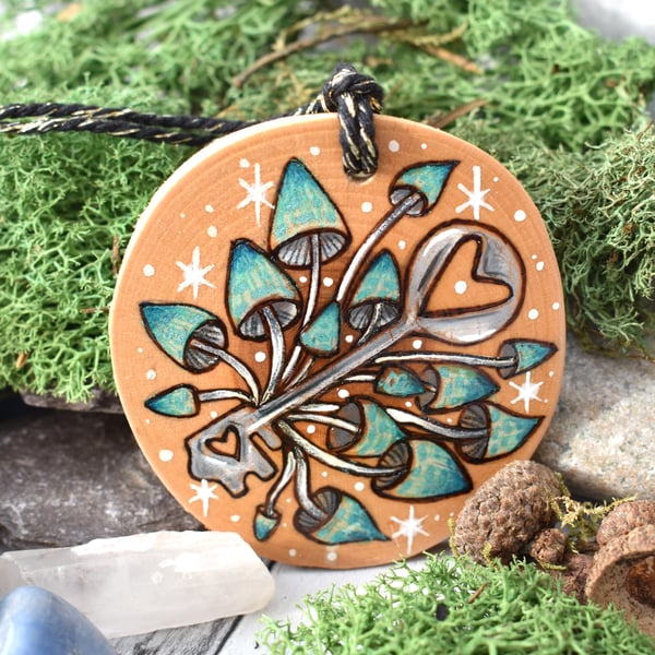 Steampunk fungi key. Pyrography hanging disc, personalisable.