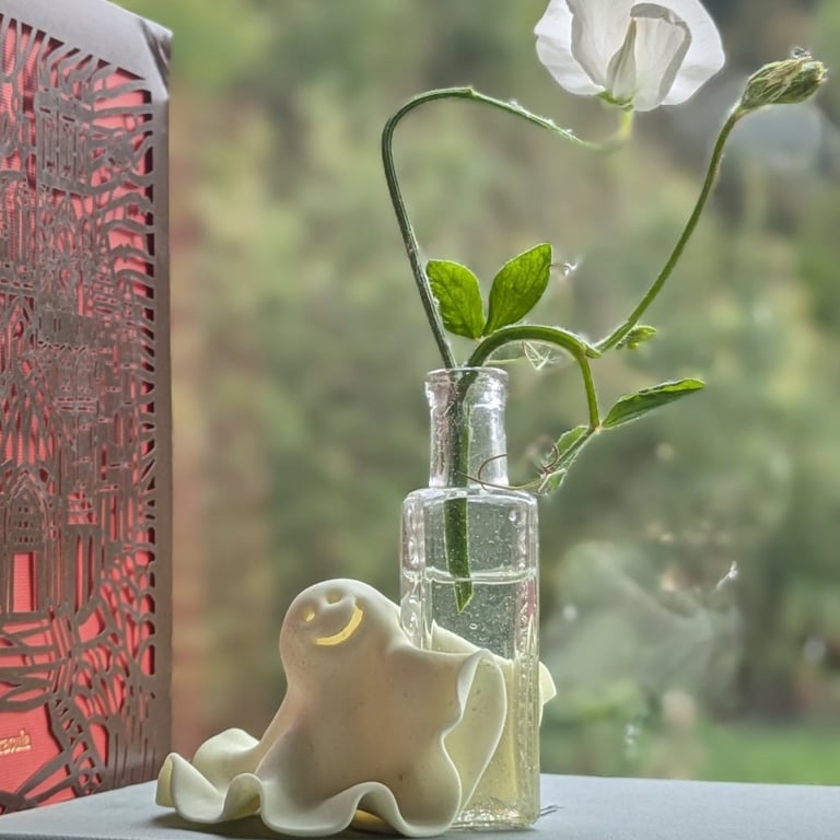Una - Glow in the dark polymer clay & vintage glass bud vase 