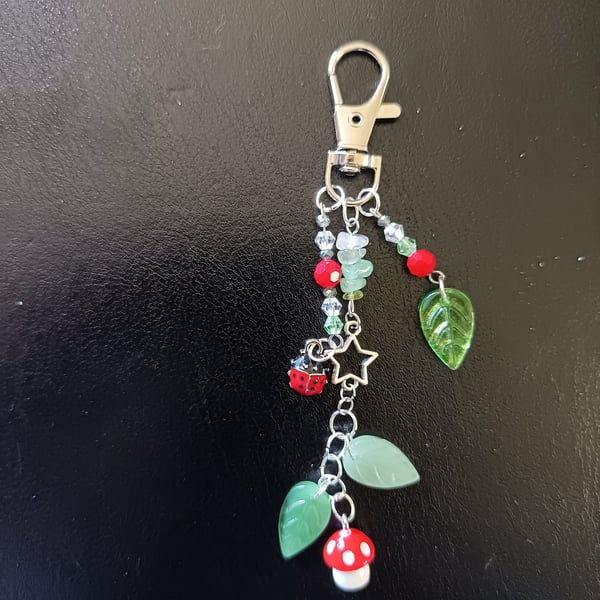 Cottagecore bag charm with beads, leaves, toadstool and ladybird charms