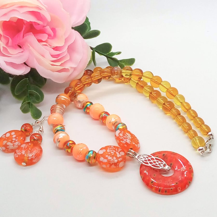 Millefiori Pendant on a Topaz and Orange Beaded Necklace and Matching Earrings