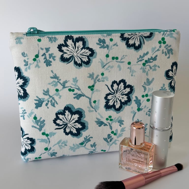 Large flat cotton zipped pouch, purse, make up bag in blue floral design 