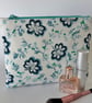 Large flat cotton zipped pouch, purse, make up bag in blue floral design 
