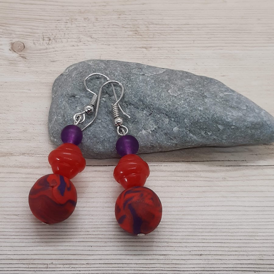 Poppy red and purple dangly earrings