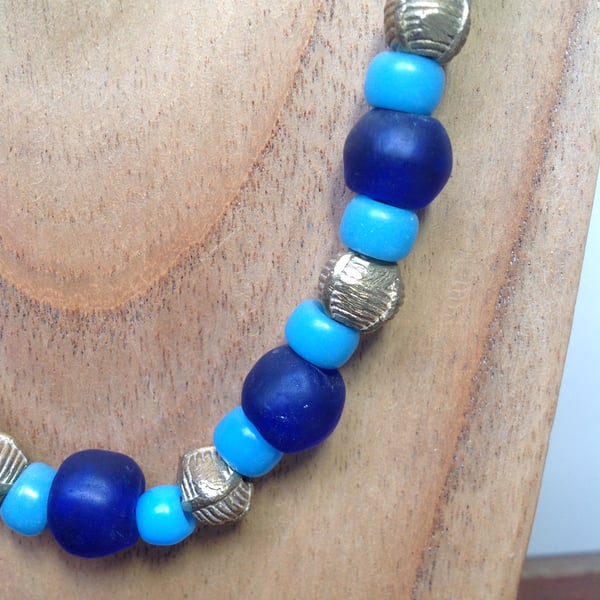 Blue and turquoise glass beaded necklace with chunky African brass beads