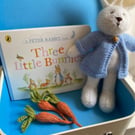 Hand knitted Peter Rabbit with story book in a carry case