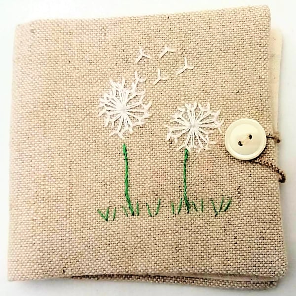  Sewing needle case with hand embroidered flowers.