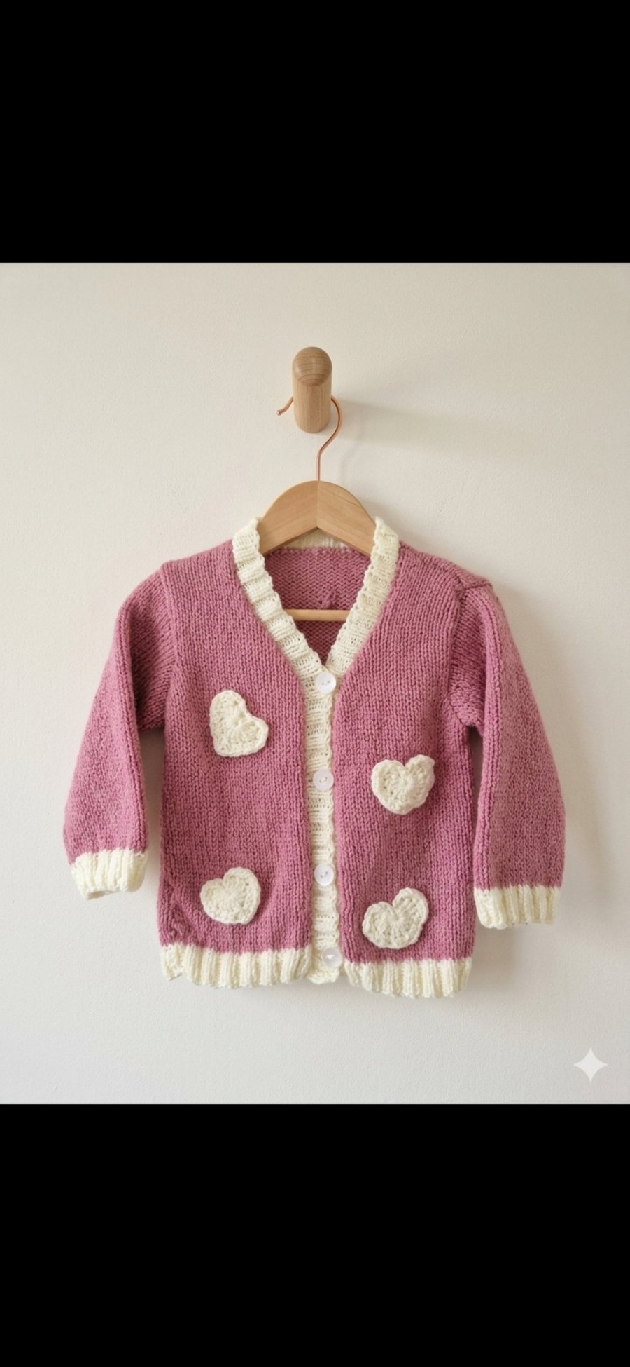 Hand-knitted girls cardigan, 12m to 2 years. Pink with ivory crochet hearts