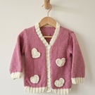 Hand-knitted girls cardigan, 12m to 2 years. Pink with ivory crochet hearts