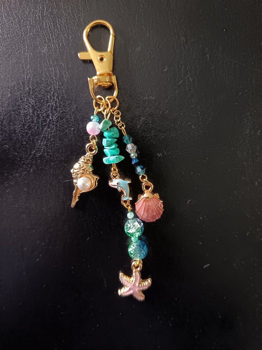 Gold nautical themed beaded bag charm 