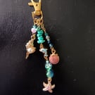 Gold nautical themed beaded bag charm 
