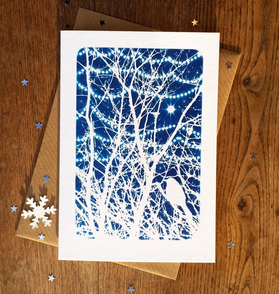 Bird in winter branches with twinkly lights card from Cyanotype image